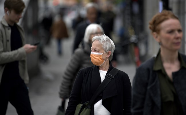 WHO skärper nu sina rekommendationer och uppmanar till utökad användning av munskydd. Arkivbild.