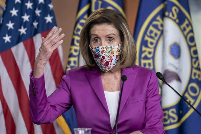 Nancy Pelosi, demokrat och talman i USA:s representanthus, meddelar att kammaren i början av veckan kommer att rösta för att uppmana vicepresident Mike Pence att avsätta president Donald Trump. Arkivbild.