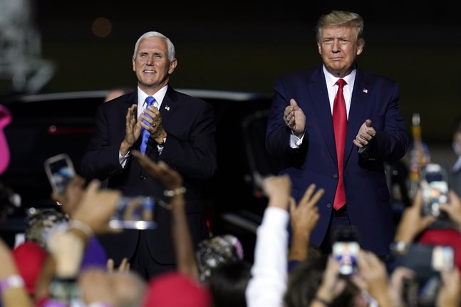 President Donald Trump och vicepresident Mike Pence vid ett kampanjmöte i Newport News i Virginia i september förra året. Arkivbild.