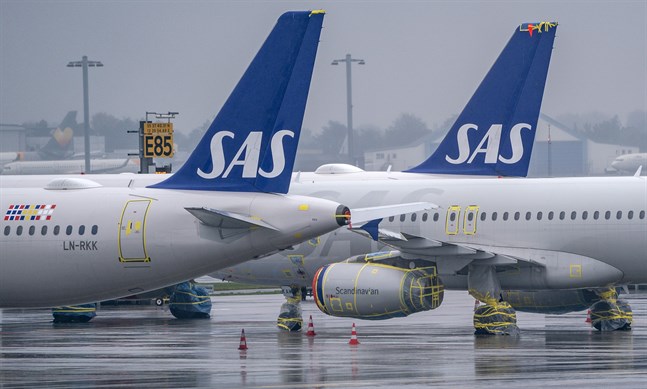 Flygbolaget SAS, med den avgående vd:n Rickard Gustafson, redovisar delårsrapport.