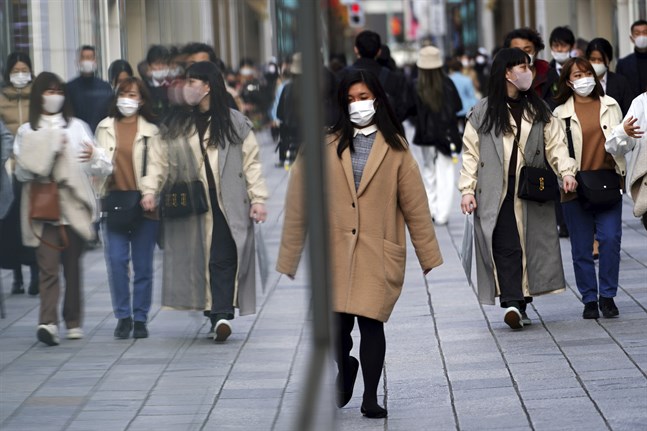 Tokyobor i munskydd.