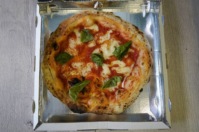 Kan rabatt på pizzan övertyga tveksamma unga att vaccinera sig? Det hoppas i alla fall den brittiska regeringen. Arkivbild