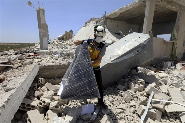 Ett hus som träffats av granateld i den oroliga provinsen Idlib i Syrien. Arkivbild.