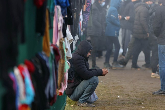 Migranter vid den belarusisk-polska gränsen.