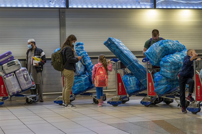 Köer på flygplatsen i Johannesburg i Sydafrika.